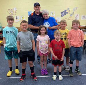 Also in the photo: Back Row (from left) Jude Dawson, Bailee Beiermann and Wyatt Snyder; Front Row (from left) Harlen Claussen, Colin Brockhouse and Asher Dawson.