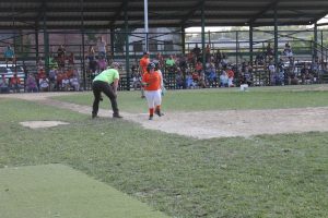 Base hit!  An Oriole cruises safely into first base with a single in the Minor League Baseball action.