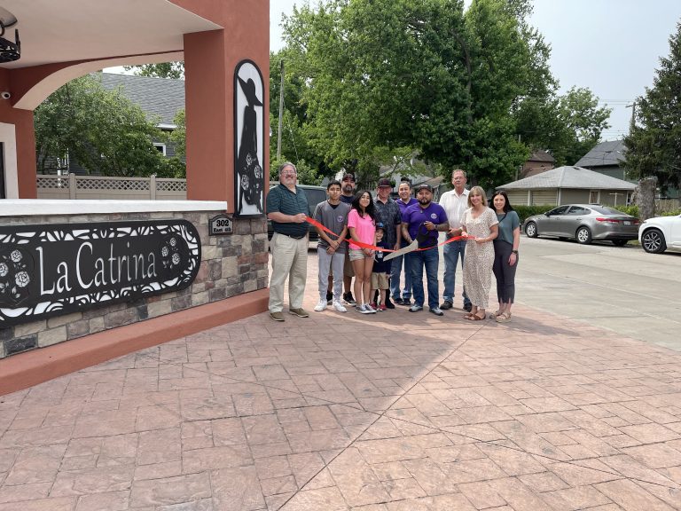 Shown from left are Chamber of Commerce Board member Dustin Fritche, Hector Alvarado, Jr., Martin Hernandez, Jr., Amber Alvarado, Martin Hernandez, Neri Hernandez, Hector Alvarado, Beardstown Mayor Tim Harris, Chamber Board Members Beth Jones and Mackenzie Pilger