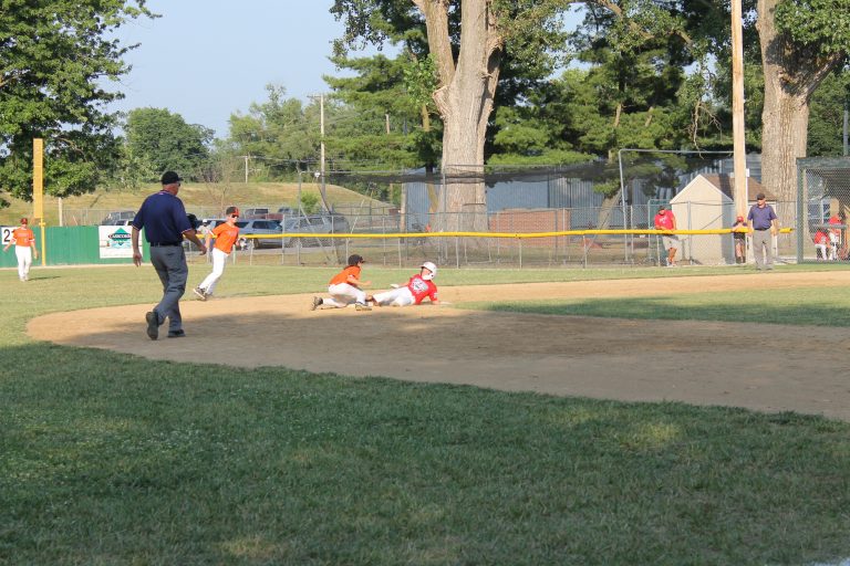 Out!  Ashten Guzman applies the tag at second base.
