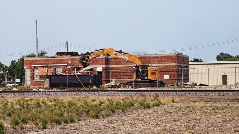 A piece of Beardstown histroy is leaving. The old Beardstown CB&Q Depot is being demolished. This was the terminal that was used for loading and unloading passengers. Beardstown’s CB&Q passenger station was last used by passenger trains in 1961. In recent years the building has been used by BNSF Railway Maintenance of Way crews. Photo by Jaime Chapman