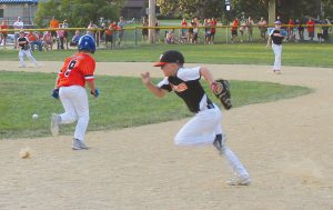 The Tiger’s Bo Sorrells breaks for second as the Bomber defense reacts to a ground ball on the right side in All Star action.