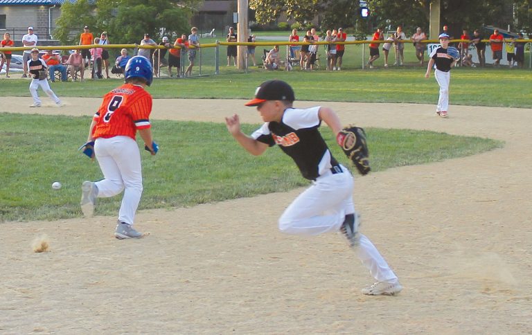 The Tiger’s Bo Sorrells breaks for second as the Bomber defense reacts to a ground ball on the right side in All Star action.