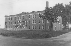 Tourists using the WPA Illinois guidebook most likely drove past Schmitt Memorial Hospital.