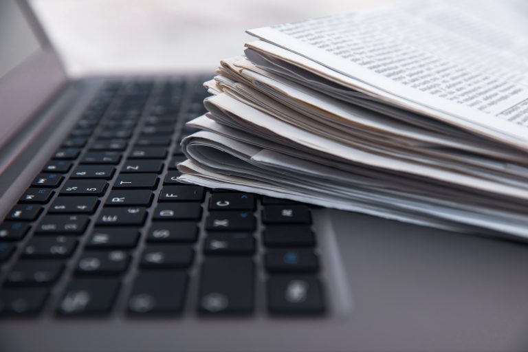Newspaper & Laptop