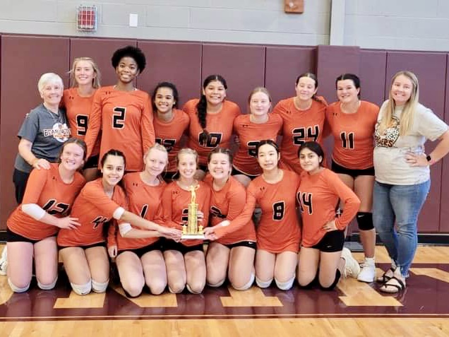 The Beardstown Junior Varsity volleyball team and coaches are pictured with the Consolation Trophy from the Mendon JV Tournament.