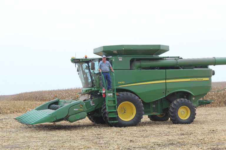 David Petefish on his combine among his corn fields. Photo By Michelle Carty