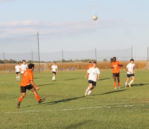 Defender Edwin Basaldua sends the ball out of the scoring zone for Beardstown.