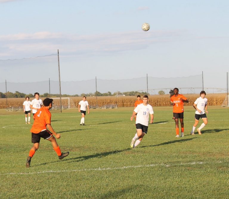 Defender Edwin Basaldua sends the ball out of the scoring zone for Beardstown.
