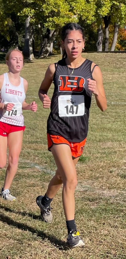 Diana Huerta tries to pull away from a pack of runners during Regional Cross Country action.