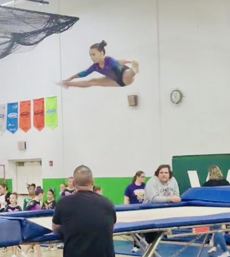 Finnley Cook is shown performing a straddle jump in the beginning level on trampoline where she placed 1st at this meet and achieved the highest scoring pass at the meet. Finnley is a 3rd grader at Beardstown Christian Academy with proud parents, Gennah and Kyle Cook of Beardstown.