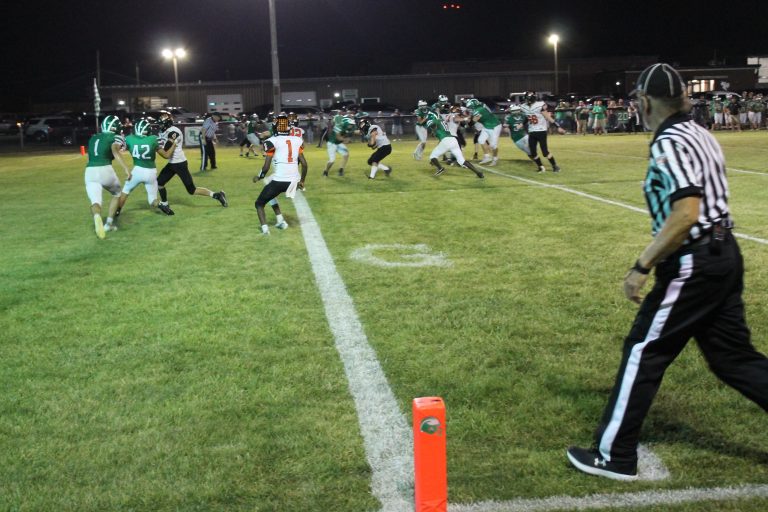 Ethan Heller lowers his shoulder on his way to the end zone.