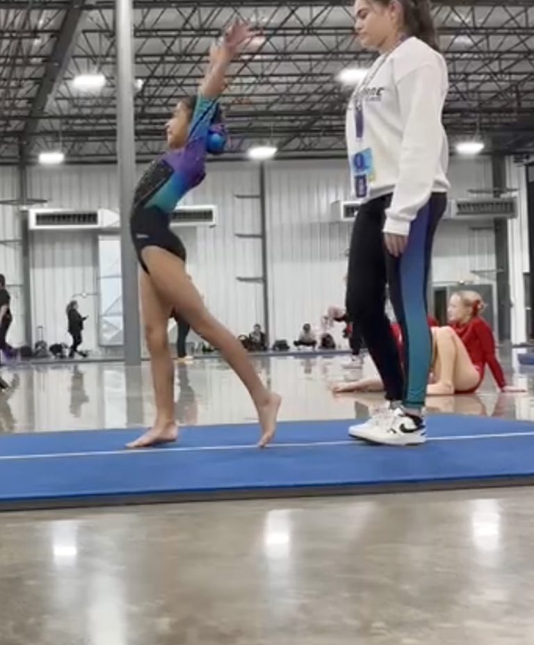 Genesis Sanchez getting ready to salute the judges to perform her tumbling pass. Genesis is a 4th grader at St. Mary’s School with proud parents, Stephanie Tafoya and Cesar Sanchez of Beardstown.