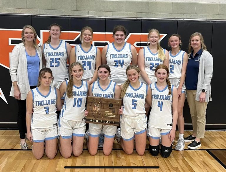 The Triopia Lady Trojans are pictured with the Fourth Place plaque from the Waverly Tournament.