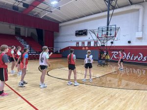 The Virginia-Triopia Junior High Girls Basketball team practice their shooting using the new Dr. Dish basketball machine the program purchased this season. The team would like to thank all of the community members, as well as the Virginia and Triopia Boosters for their generous donations. With this, current and future Lady Redbirds will be able to develop their skill level in order to be successful.