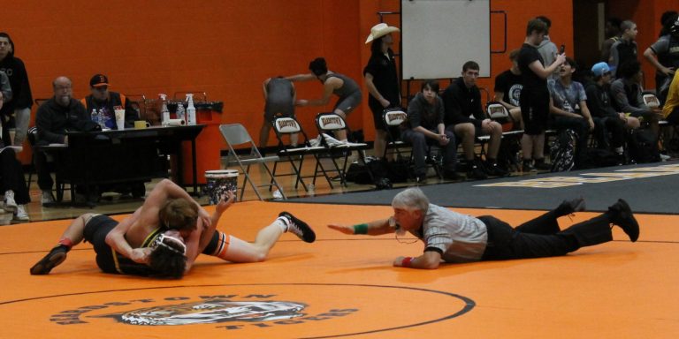 Ryder Hamlin gets a quick pin for the Tigers.