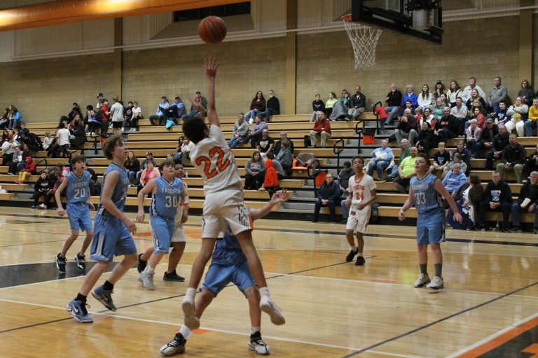 Brandon Figueroa goes up for Beardstown in junior high action against Triopia.