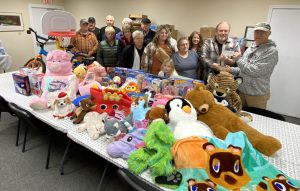 The Late Knight Cruisers Car Club recently made a donation of toys to the Schuyler Christmas Program. A cash donation was also made to the Schuyler Christmas Program and Beardstown Shop with a Cop Christmas Program.