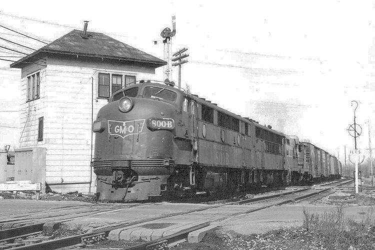 A southbound Gulf, Mobile & Ohio freight speeds by the Iles Junction tower, the site of the 1912 attempted train robbery. The tower has been removed and the rail line is now part of the Union Pacific system.