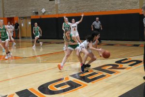 Camila Salazar makes a spin move while Bell Palmer calls for the ball on the block against Athens.