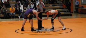 Sportsmanship! Caleb Hobrock shakes hands with his opponent prior to their match.
