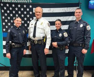 Shown from left are Jade Bowen, Chief Coad, Jacquelyn Birdsell and Thomas Hart. 