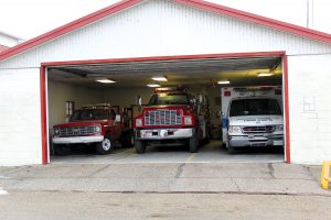 Pictured above emergency vehicles are ready to roll at a moments notice at the Chandlerville Firehouse. Photo by Michelle Carty