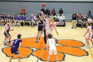 The opening tip of off the Beardstown vs. Rushville-Industry JV game in the 1959 Gym.
