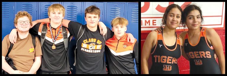 Pictured on the left are the Tiger JV Wrestlers after their match in Springfield (L/R): CJ Evans, Caleb Hobrock, Bradley Locklear and Carter Davis. Pictured on the right are Layla Garcia (left) and Daisy Gil who wrestled at the first annual Jacksonville Girls Wrestling Tournament.