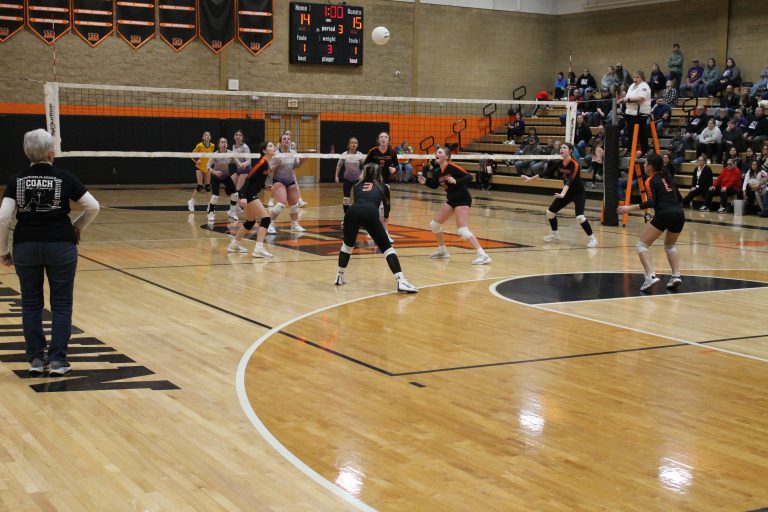 All eyes are on the ball in a home volleyball game against Rushville-Industry.