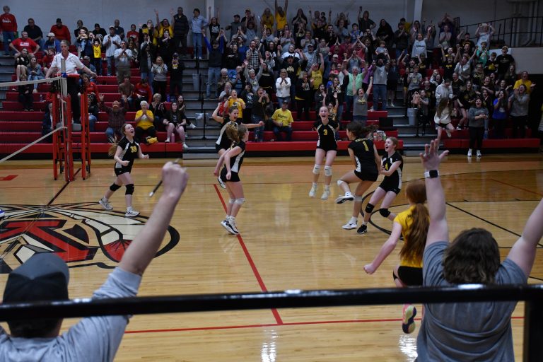 Pure joy! The AC-Central 7th grade volleyball team reacts after winning the final point of the Sectional Championship game to punch their ticket to the State Tournament. The Lady Knights post season run would take them all the way to Second Place in the state of Illinois in Class 1A.