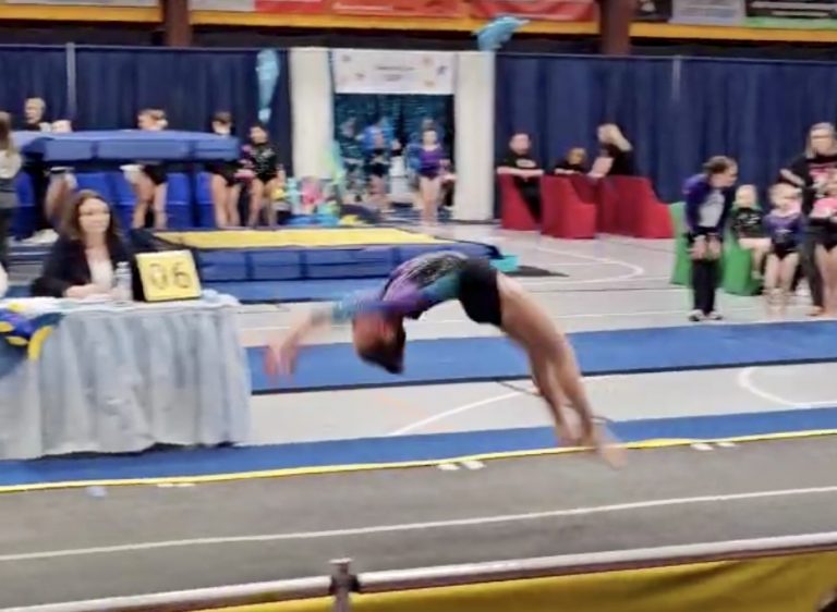 Madison Griffin executing a backhandspring on floor, where she placed 1st in the Sub Novice level. She is a 4th grader at Central Middle School with proud parents, Dustin & Megan Griffin of Camp Point, IL.