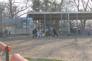 Hallie Lawson times up the pitch in the home opener for Beardstown softball.
