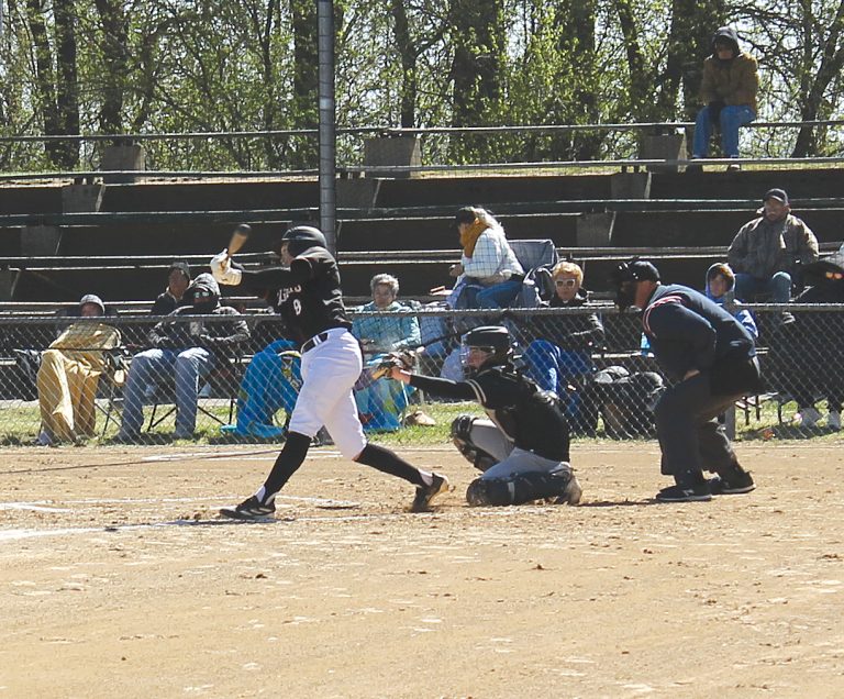 Senior Gustavo Cortes fouls one off for the Tigers.