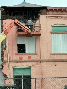 Building construction on the corner of Washington and Main street.