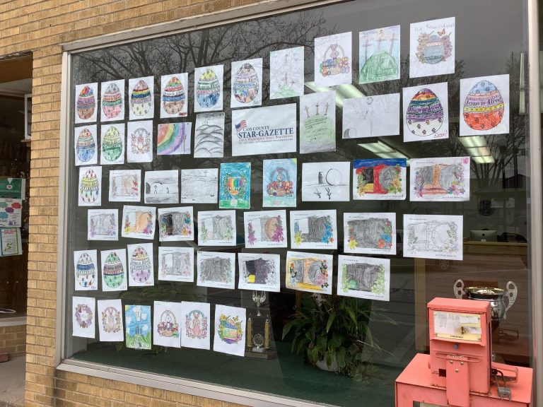 The Cass County Star-Gazette Office Decorated with Easter drawings and coloring pages.