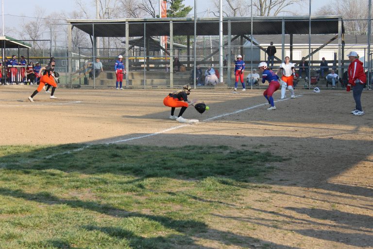 Third baseman Cami Coats makes a play right down the line for the Lady Tigers.