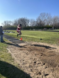 Cristian Provo competes in the long jump for the Virginia-Meredosia-Triopia Track team.