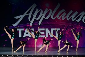 “Schoolin’ Life.” Left to Right = Ainsley Hills, Maddie East, Yasmin Lopez, Ava Davis, Makaylin Evans, Ella Rigg, and Ronnie Wolfe