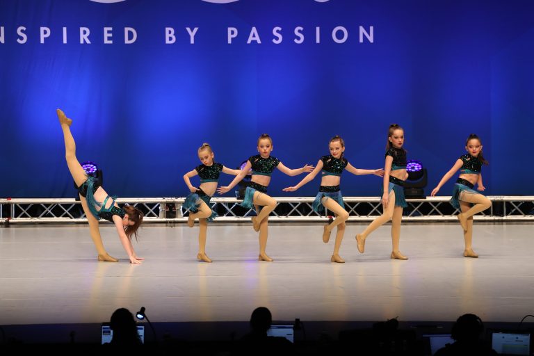 Shown above is a group picture of “Fuego.” This is a jazz routine choreographed by Laura Evans and scored the highest on our team this weekend. From left to right are Izzy Claudius, Ellie Jones, Anlee Jones, Blalynn Lovekamp, Serena Graham-Martinez, and Sapphire Graham-Martinez