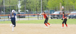 Shortstop Vanessa Nunez steps on second to get the first out of a nifty double play for BHS.
