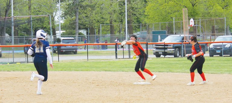 Shortstop Vanessa Nunez steps on second to get the first out of a nifty double play for BHS.