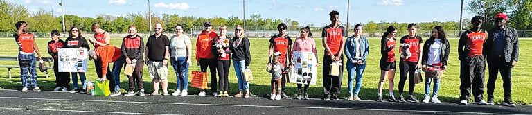 The senior members of the BHS Track Team and their families were recognized at Senior Day last week.