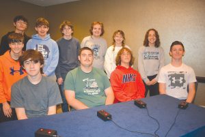 Triopia Scholastic Bowl team is shown bottom left to right: Aiden Johnson, Nate Doyle, Alex Schild, Brady Seymour; far left middle: Gavin Canada; top row left to right: Tripp Thompson, Gavin Hutson, Brooks Birdsley, Owen McCoy, Sammy Cromer and Faith Wingert