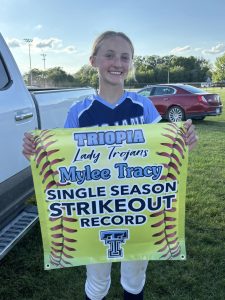 One busy lady! Mylee Tracy set the Triopia-Meredosia-Virginia Softball single season strikeout record one day after competing in the 200 and 400 meters at the IHSA State Track Meet.