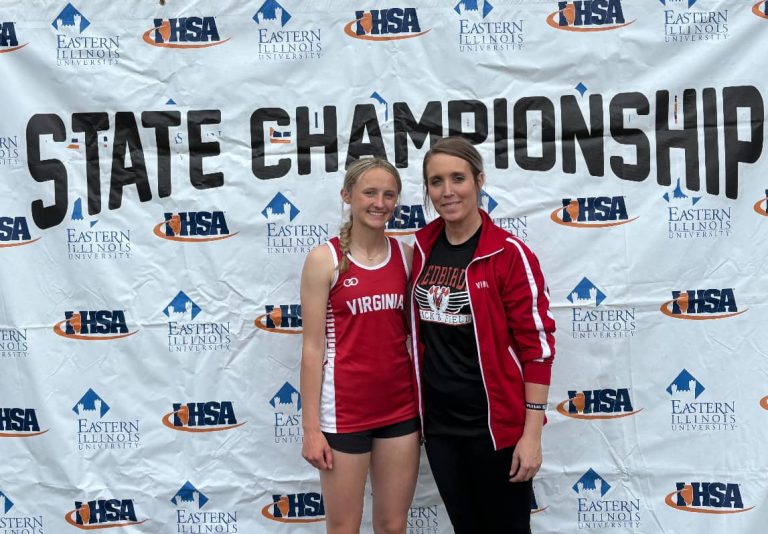 Virginia-Meredosia-Triopia’s Mylee Tracy and coach Megan Werner are pictured at the IHSA State Track and Field Finals. Tracy, also a standout player on the Trojan softball team, competed in the 200 and 400 meters at State.