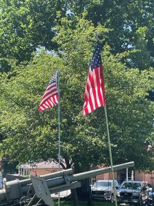 Flags fly surrounding the cannon in Art Zeeck Park. Photos by Brittney Taylor
