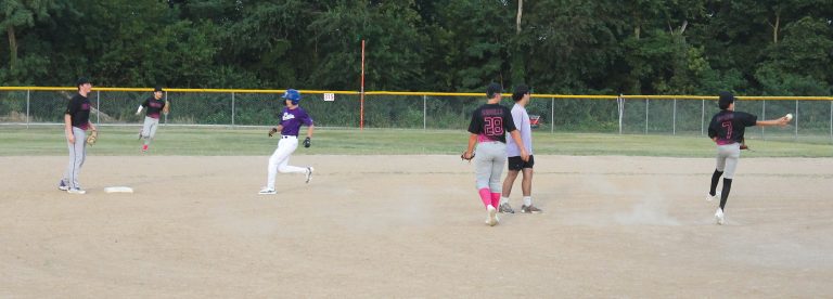 An off balance throw after a nifty play from the shortstop in the Pony League.