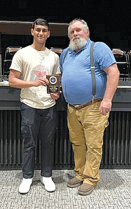 Cass Lodge #23 presented graduating Senior Purav Arvind Patel, left, with a $1,000 scholarship. Worshipful Master Bryan “Dan” Chapman, right, is shown congratulating Purav at the Senior Scholarship and Award night on Wednesday, May 22.