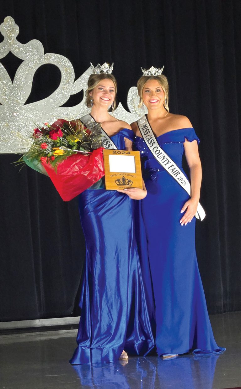 Ava Schlueter, left, was crowned Miss Cass County Fair Queen 2024 on Monday, July 15 in Virginia. Pictured with Schlueter is Miss Cass County Fair Queen 2023 Belle Carlock. Photo by Michelle Carty
